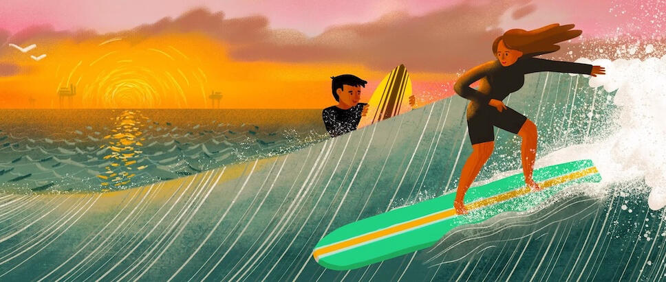 two surfers on a wave at sunset, one is catching the wave while the other floats behind it